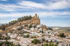 Montefrio, Granada, Andalusia, Spain. A church on a cliff above the village of Montefrio. Art Print